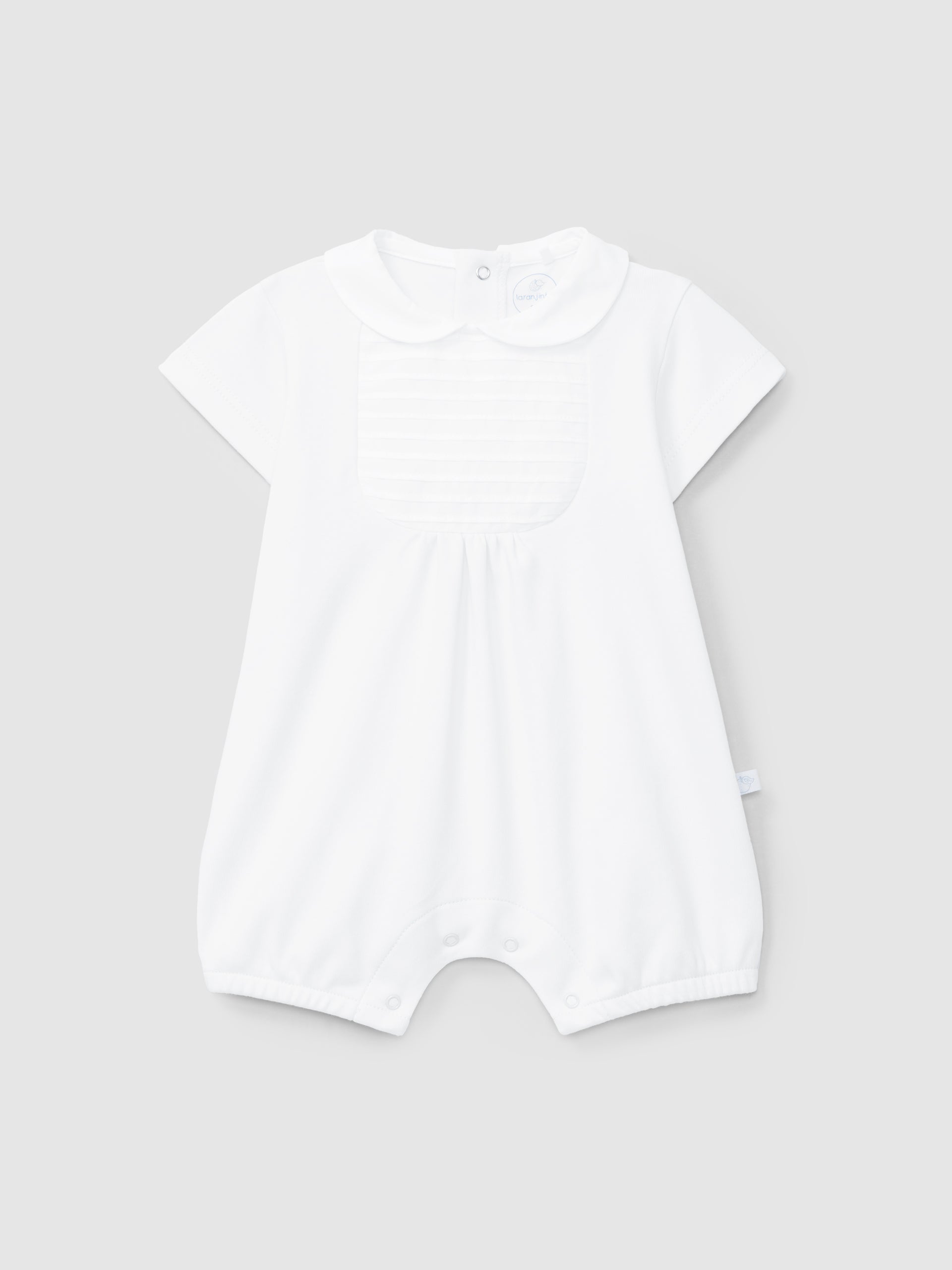 ENSEMBLE A JAMBES COURTE AVEC DETAIL DE