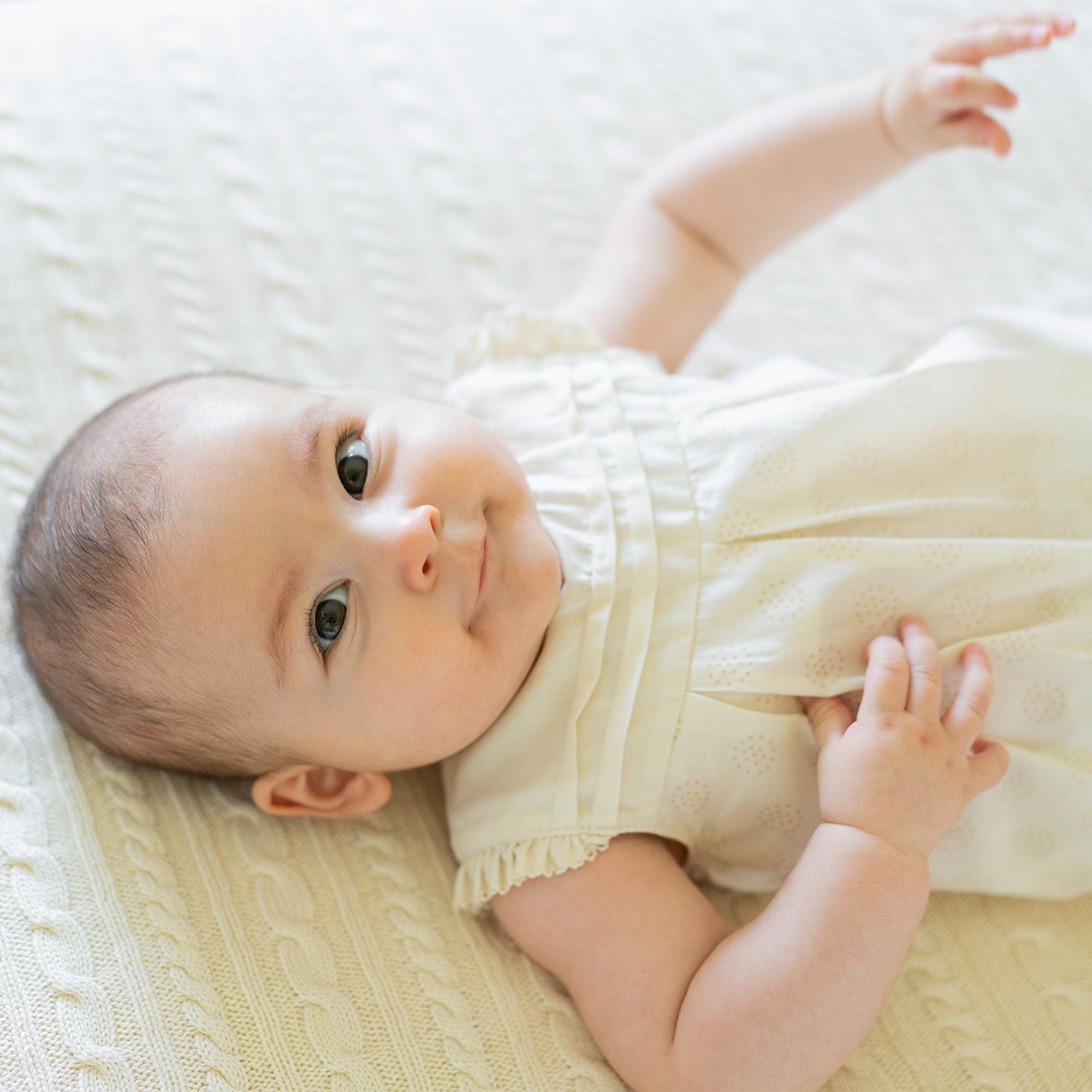 DOTTED ROMPER WITH PLEATED DETAIL