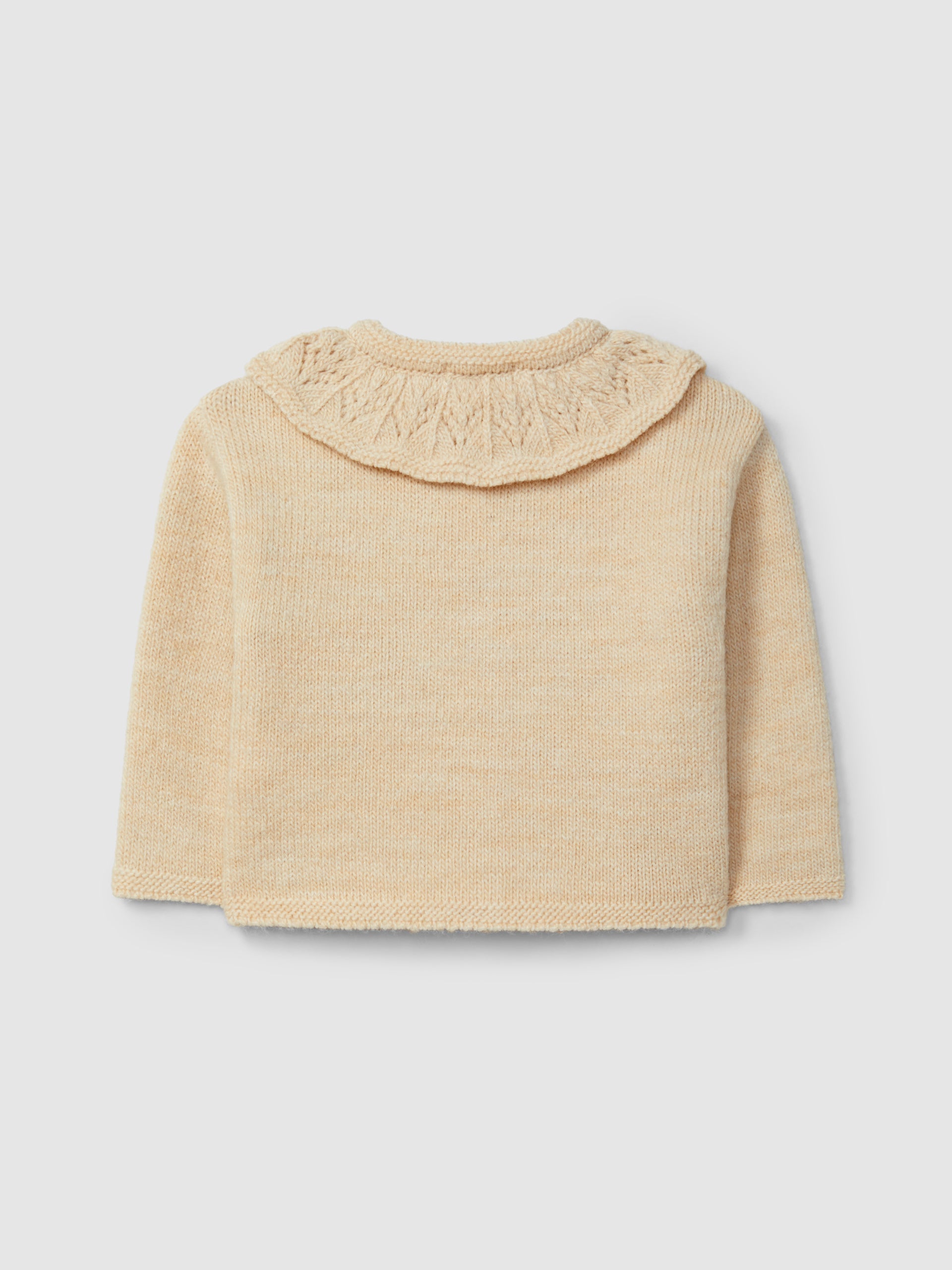 GILET TRICOTE A COL A VOLANT TRAVAILLE