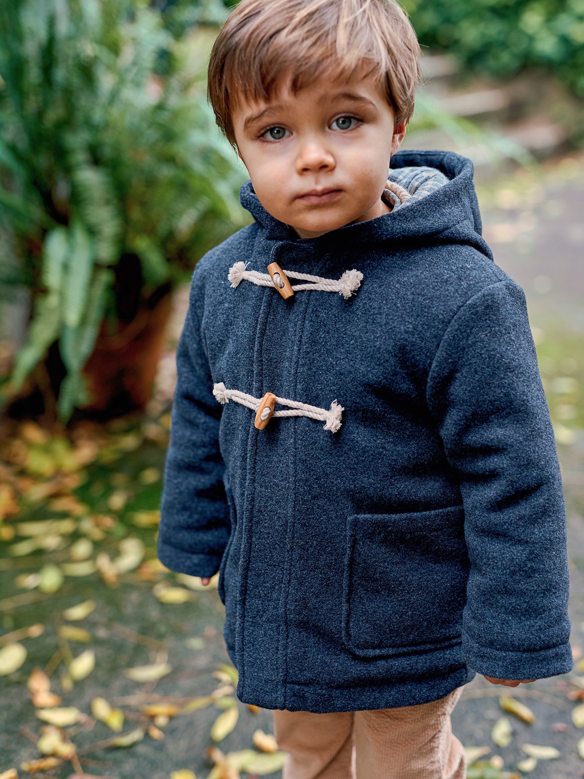 MANTEAU A CAPUCHE ET POCHES