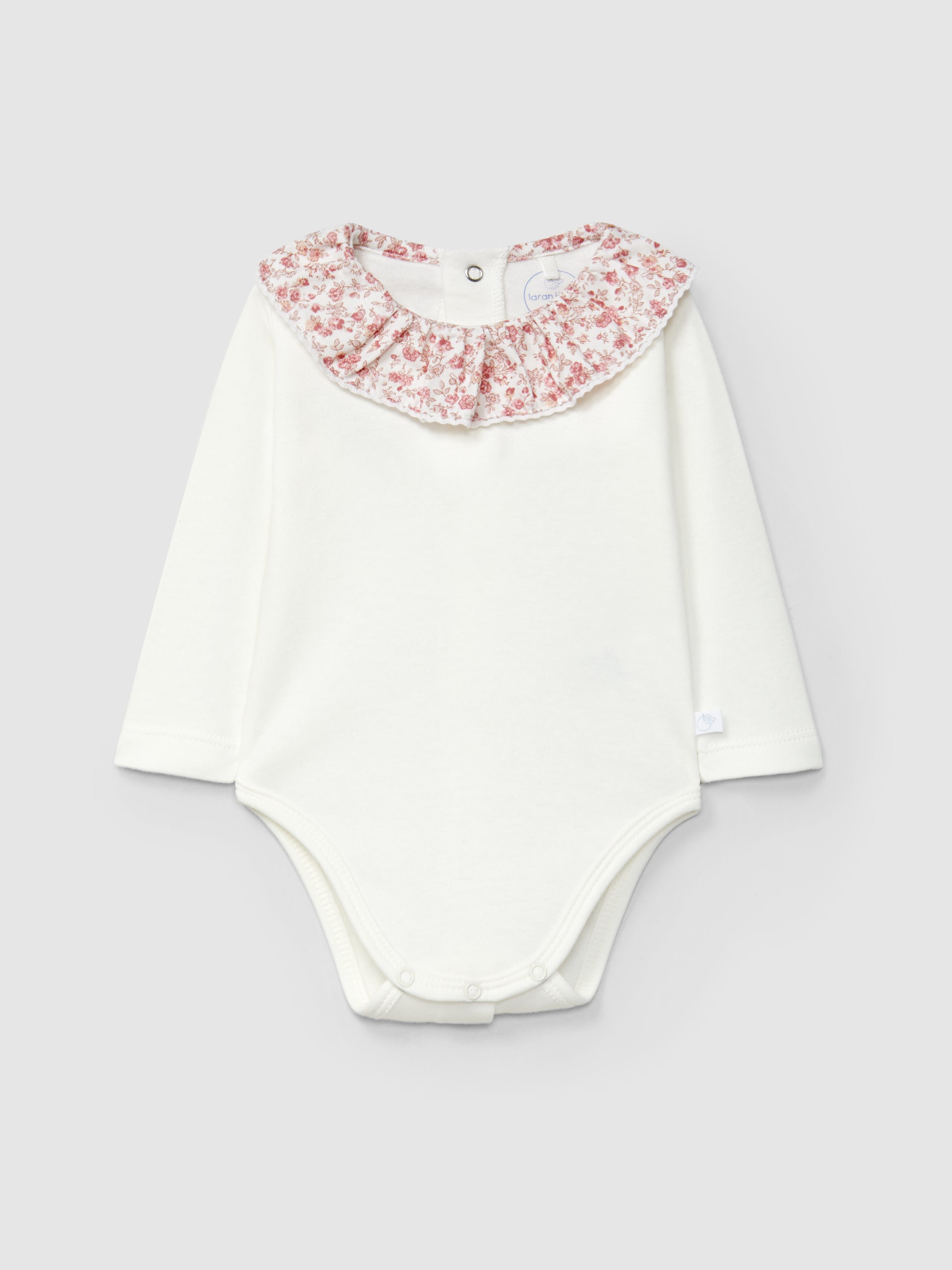 BODY COL A VOLANT EN TISSU IMPRIME AVEC DETAIL EN DENTELLE