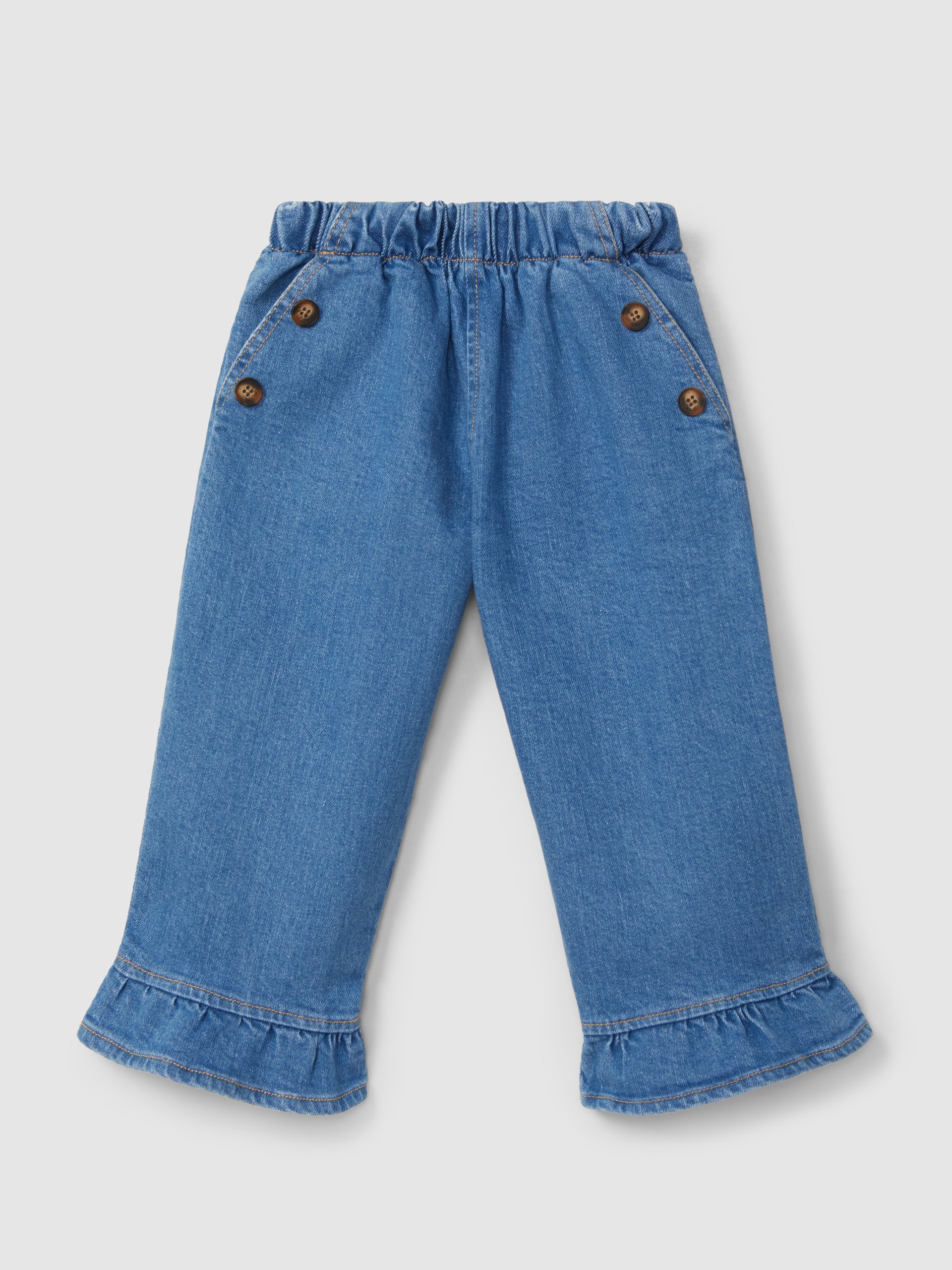 PANTALON EN JEAN AVEC DETAIL DE VOLANT