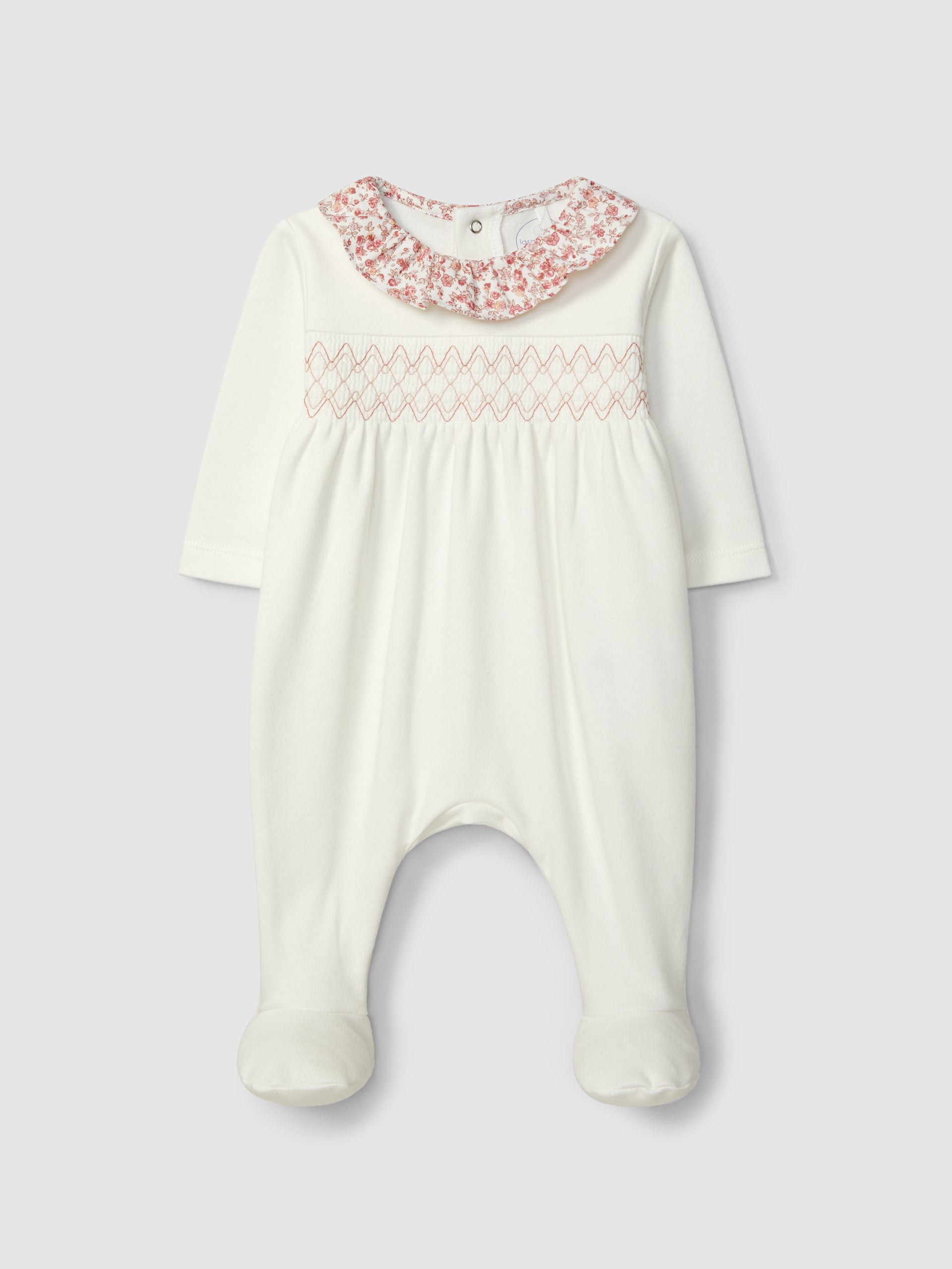 BABYGROW AVEC SMOCKS ET COL A VOLANT A IMPRIME A FLEURS