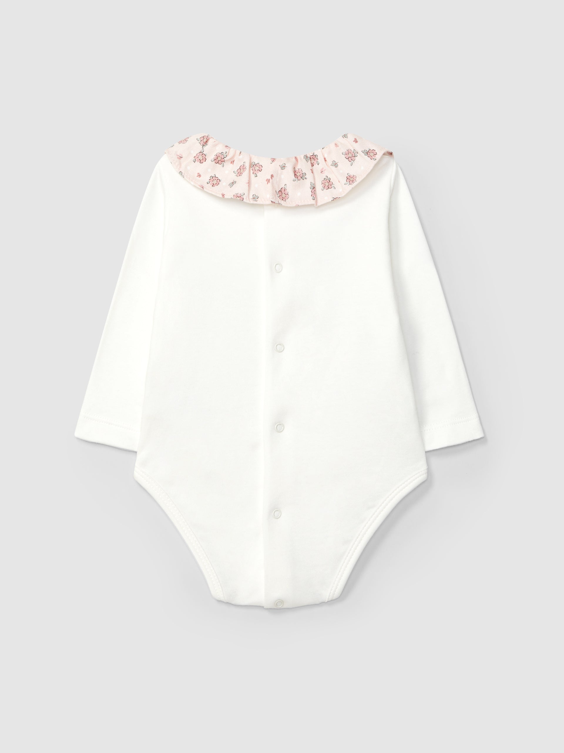 BODY A COL A VOLANT EN TISSU A FLEURS DELICATES