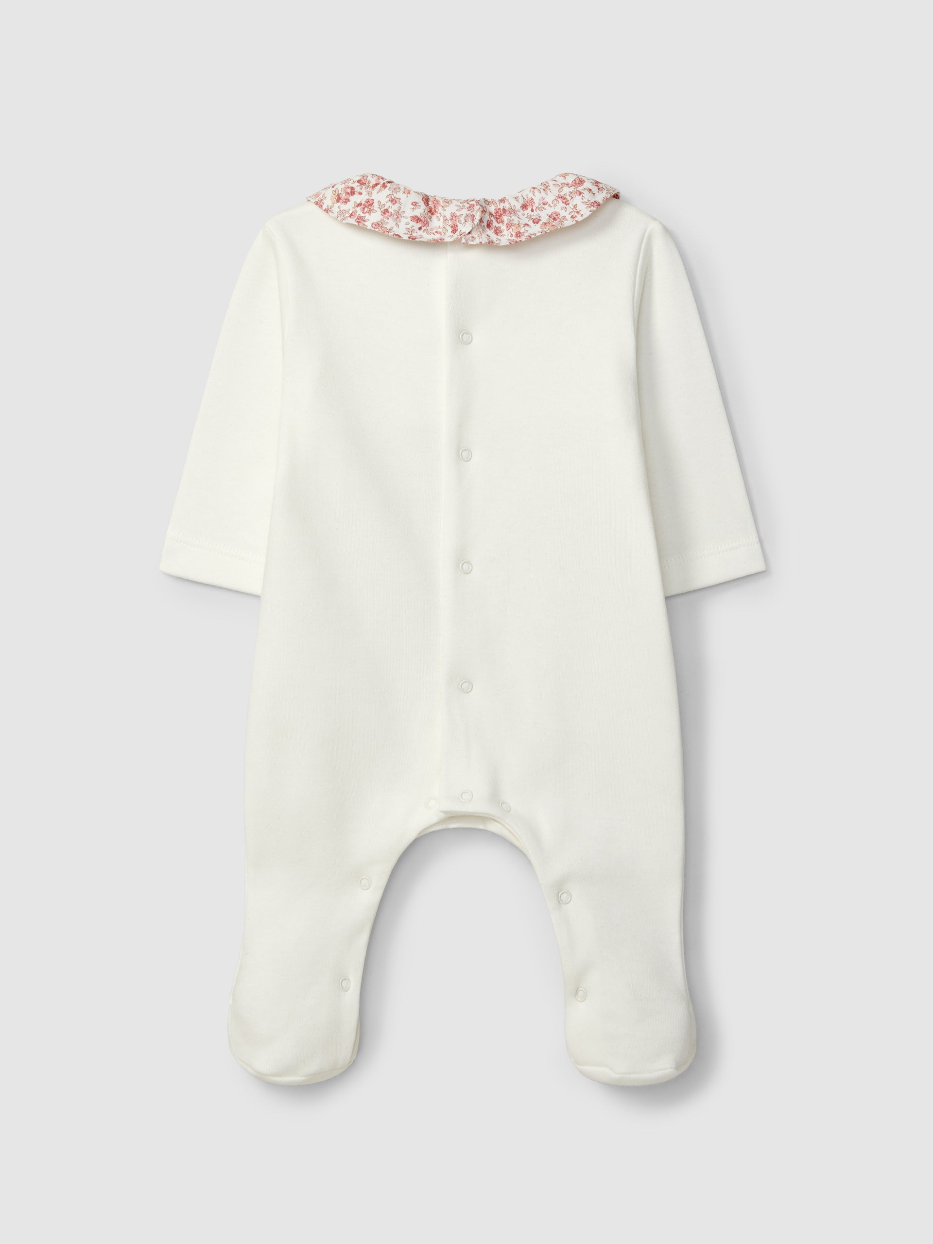 BABYGROW AVEC SMOCKS ET COL A VOLANT A IMPRIME A FLEURS