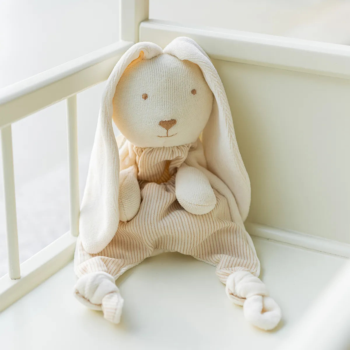 DOUDOU LAPIN AVEC ATTACHE TITINE