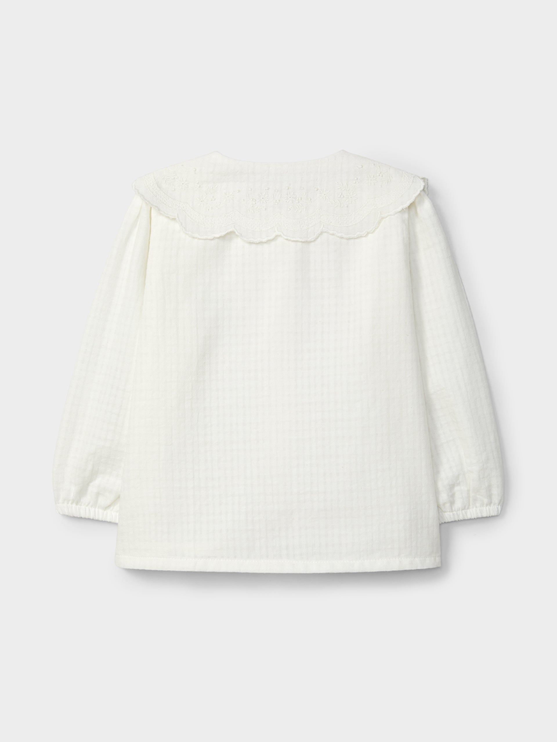 BLOUSE EN TISSU TEXTURE A COL EN BRODERIE ANGLAISE