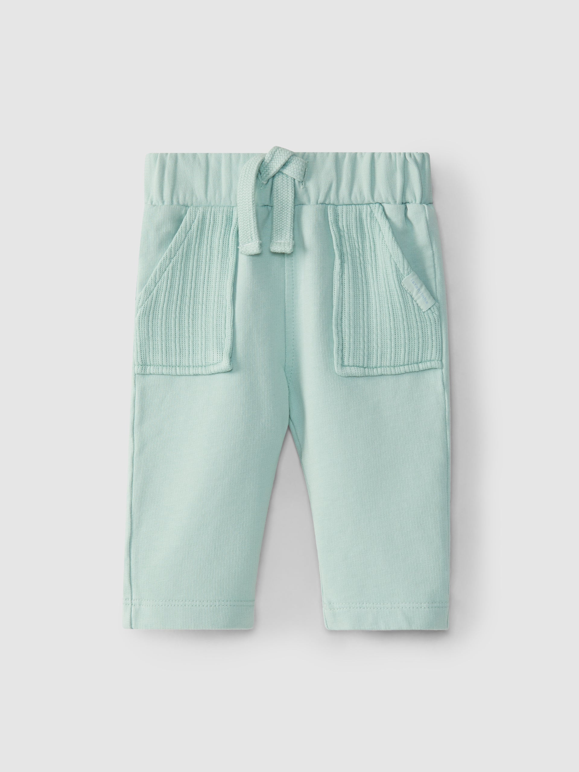 PANTALON EN PELUCHE POCHES MAILLE JACQUA