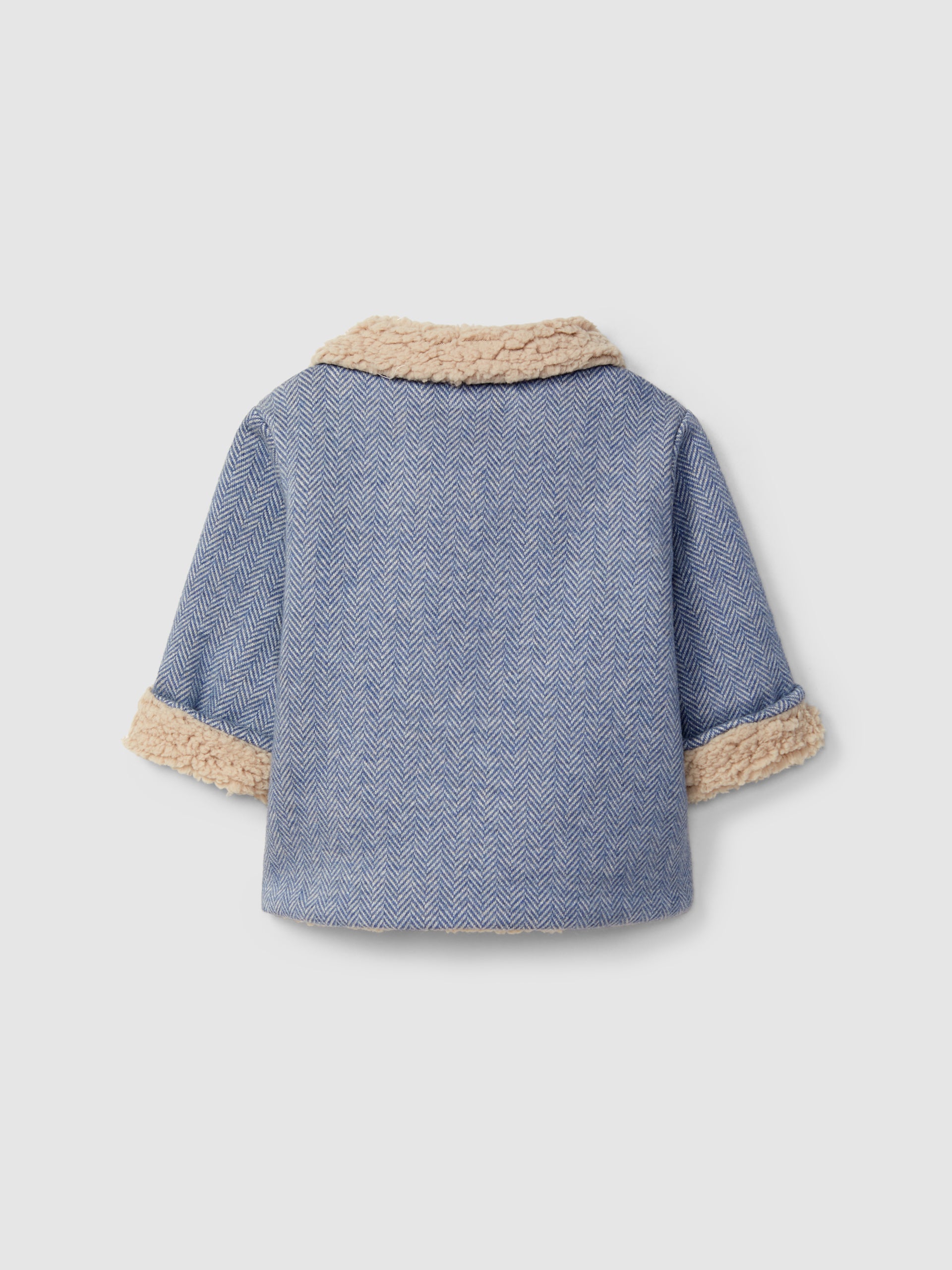 GILET EN MAILLE EN EPI DOUBLE EN FOURRURE