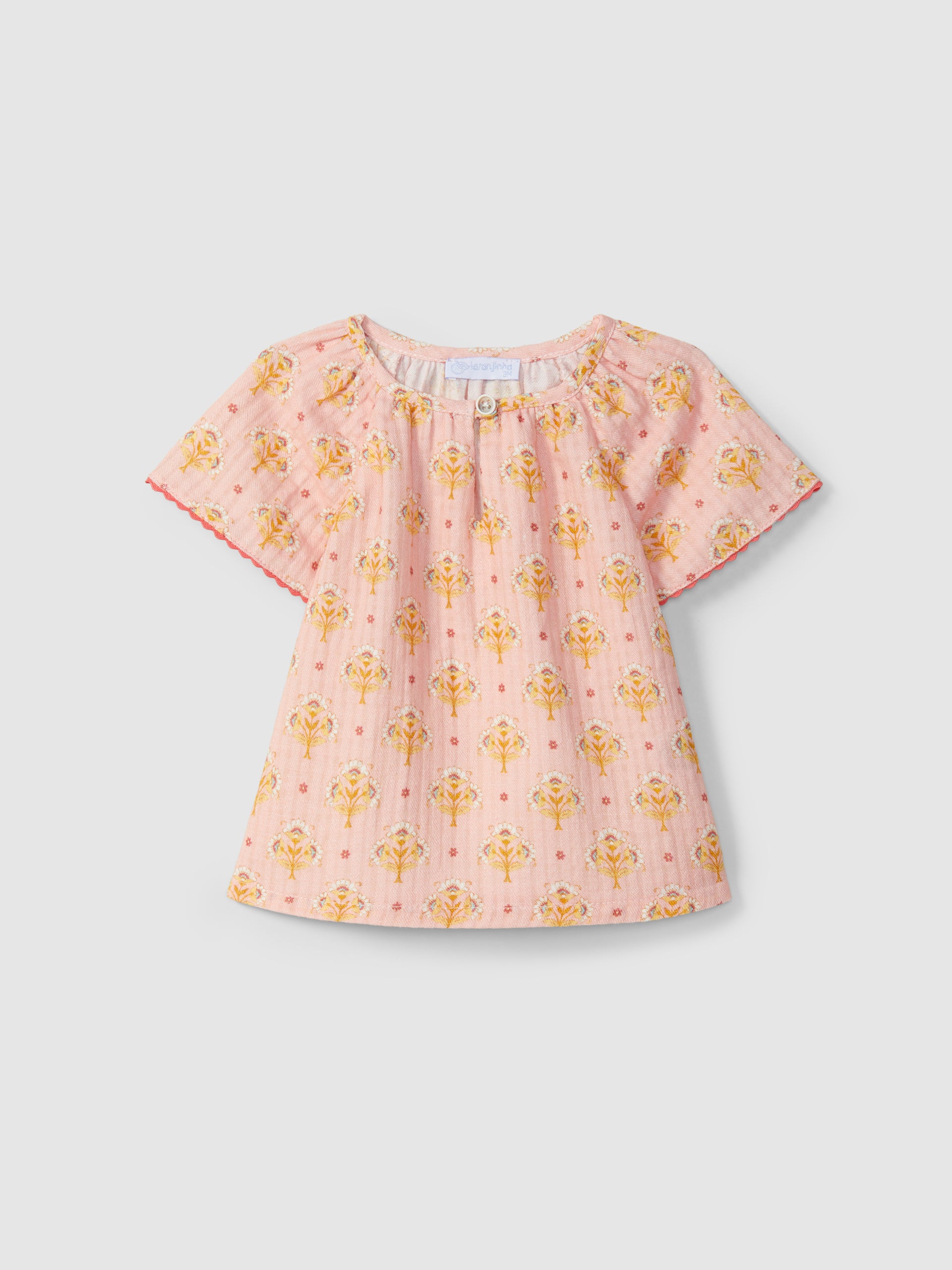 BLOUSE IMPRIME FLEURI AVEC DETAILS DE COULEUR EN CONTRASTE