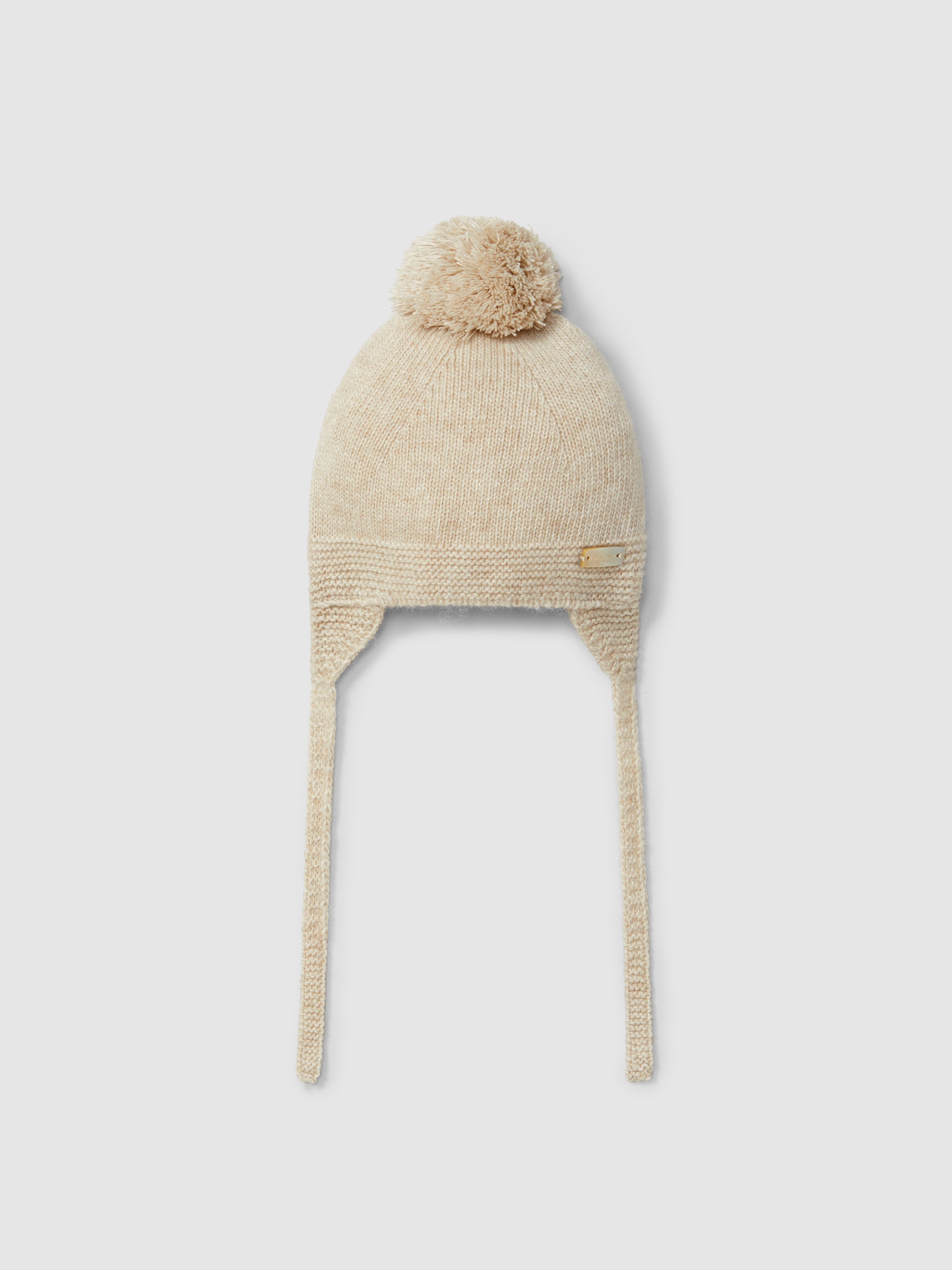 BONNET TRICOTE AVEC POMPON